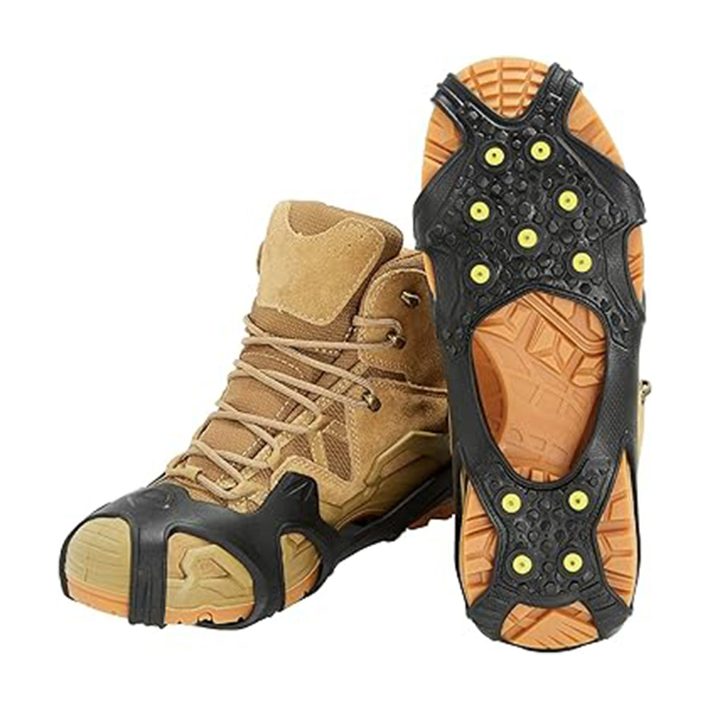 Brown boot with black ice cleats on a white background