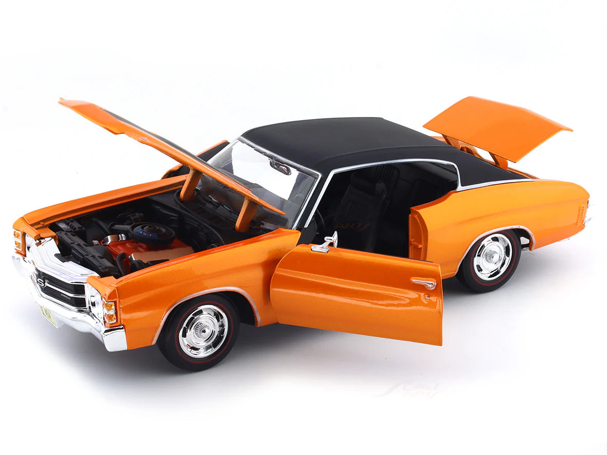 Model car with open doors and hood on a white background