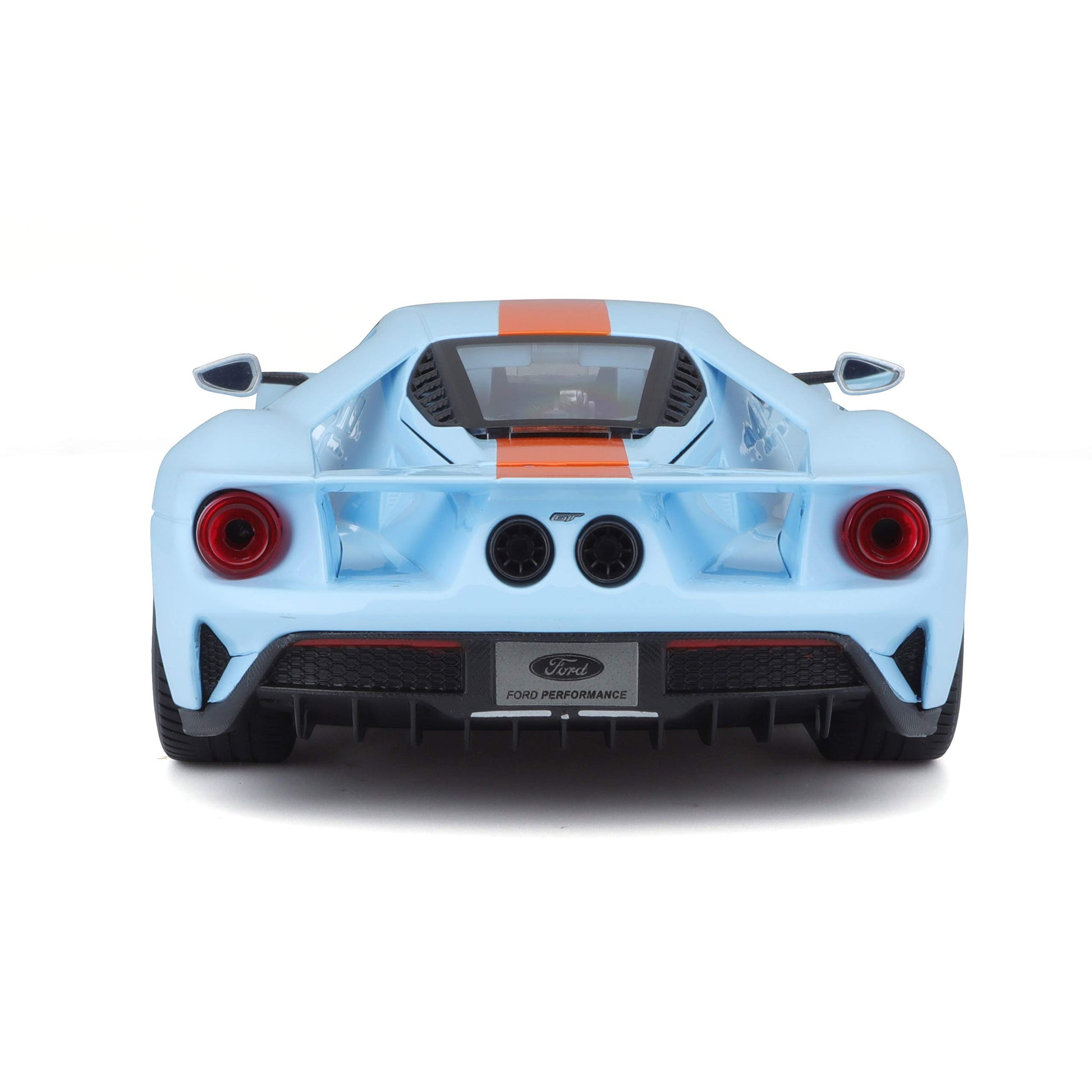 Back view of a blue Ford GT car model with red taillights on a white background