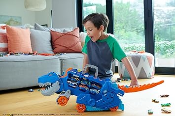Child playing with a toy dinosaur in a living room