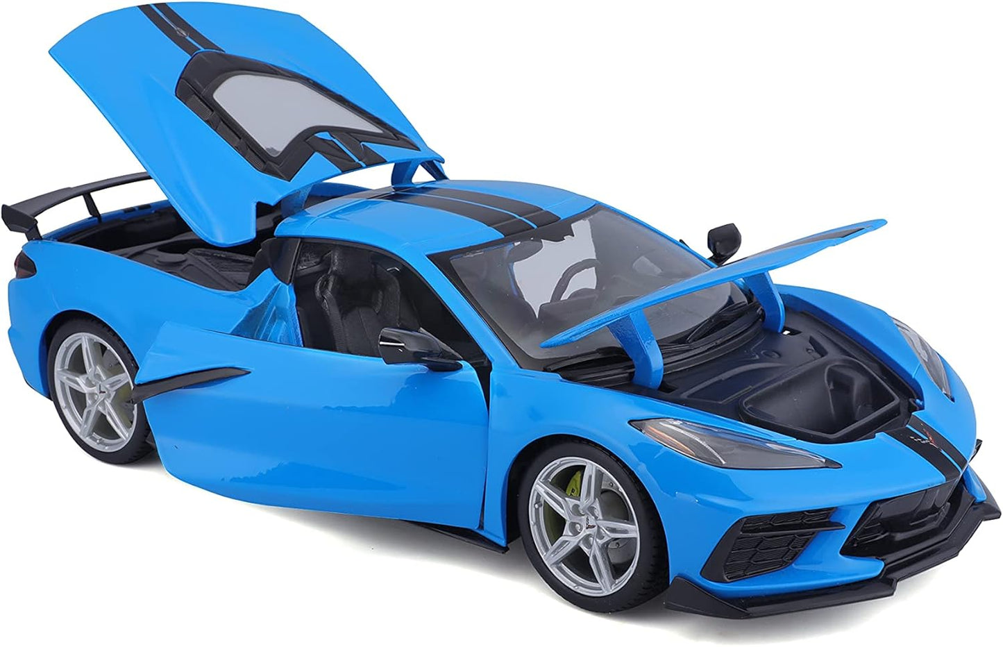 Chevrolet CorvetteBlue toy sports car with open doors on a white background