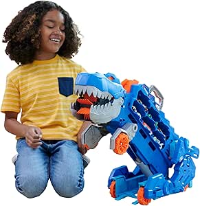Child playing with a blue toy vehicle featuring a shark design on a white background