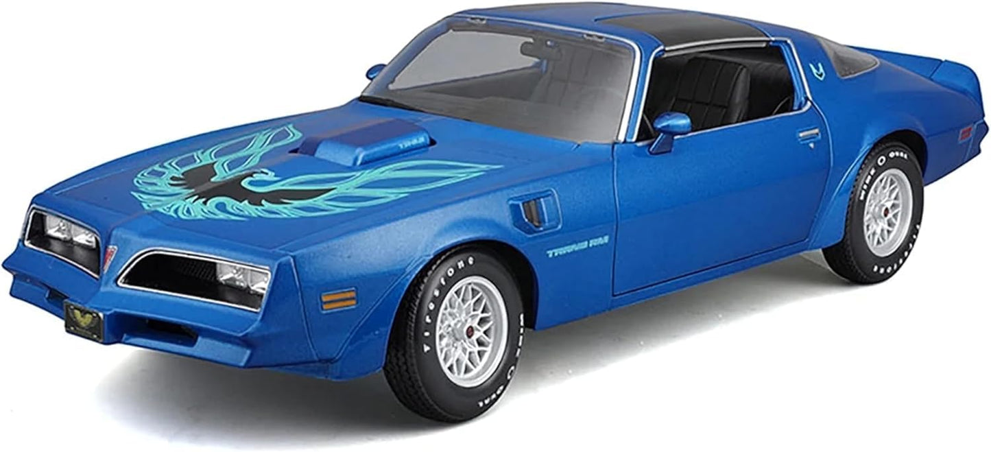 Blue muscle car model with flame design on a white background

